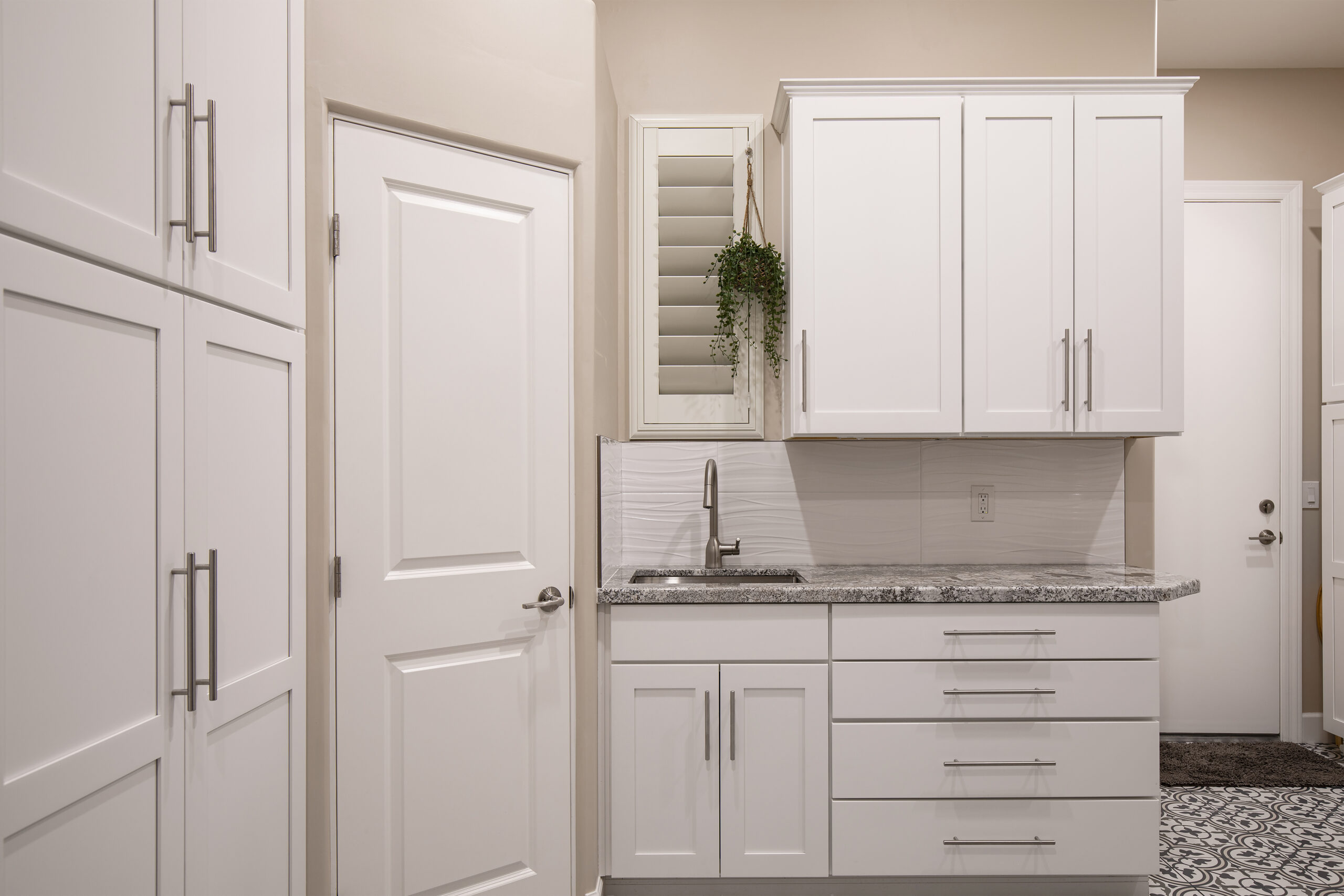 renovated laundry room by Rosie Right Remodeling